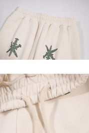 Unknown : Cream & Green Dagger Rhinestone Joggers