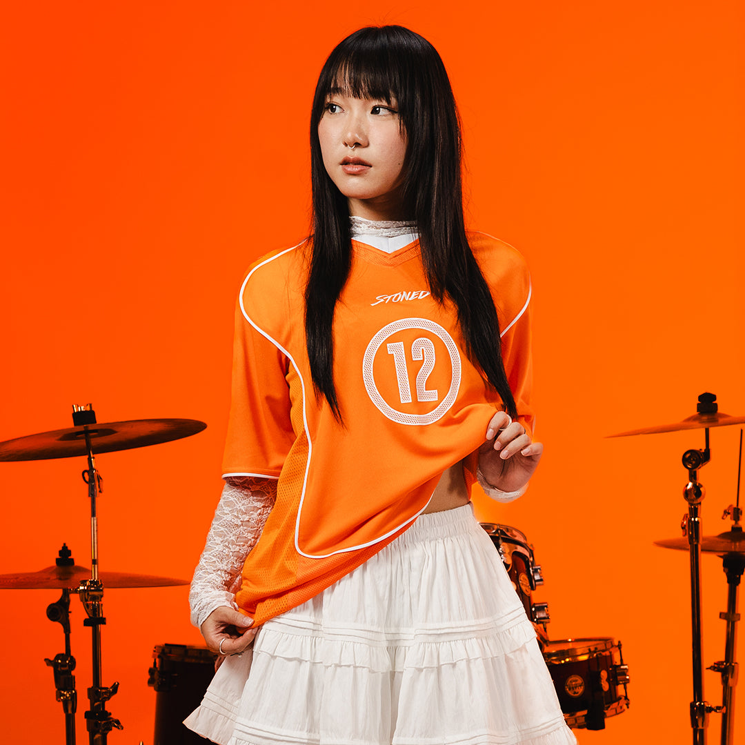 Milestoned : XII Jersey Orange